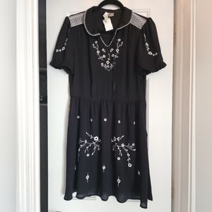 Black size 10 dress with White embroidery